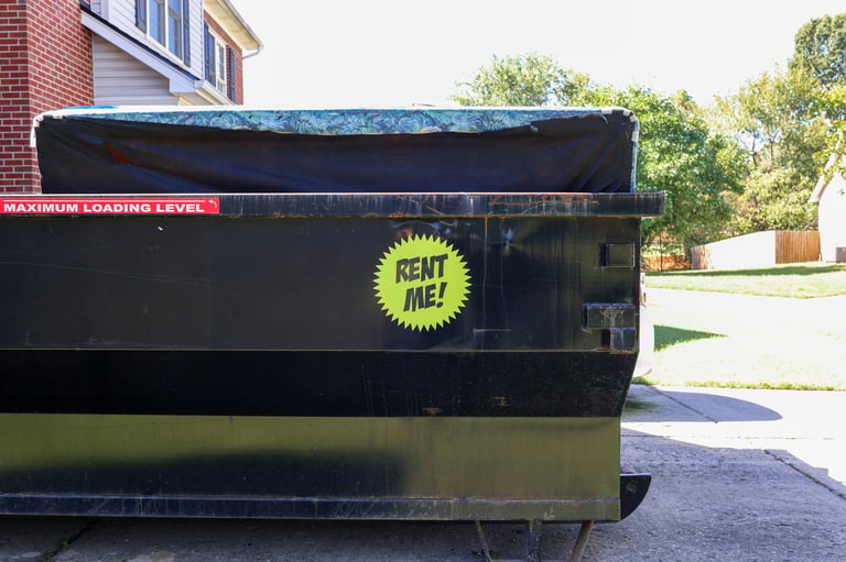 Residential driveway dumpster delivery